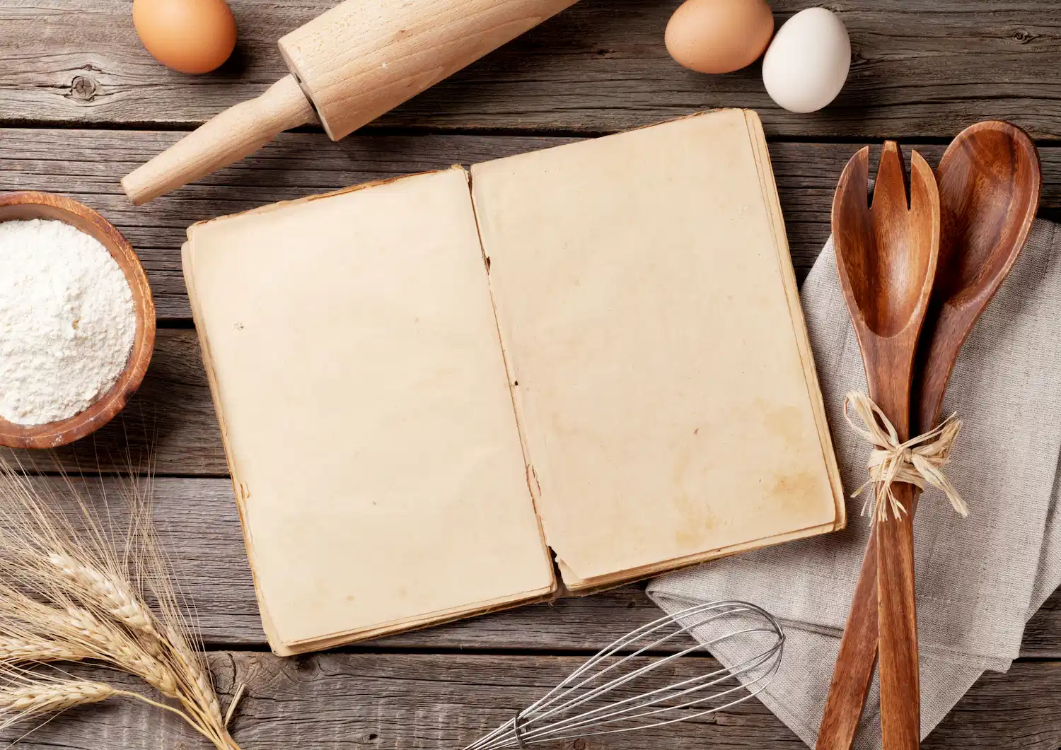 open and empty book on a cutting board